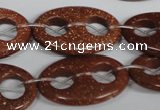 CFG307 15.5 inches 20*30mm carved oval goldstone beads