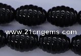 CFG759 15.5 inches 15*20mm carved rice black agate beads