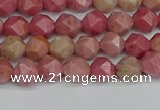 CNG7420 15.5 inches 6mm faceted nuggets rhodochrosite beads