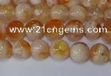 CAA1071 15.5 inches 6mm round sakura agate gemstone beads