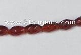 CAA124 15.5 inches 6*10mm faceted rice red agate gemstone beads