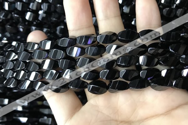 CAA2490 15.5 inches 6*12mm faceted & twisted rice black agate beads