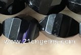 CAA2494 15.5 inches 10*14mm faceted & twisted rice black agate beads