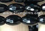 CAA2498 15.5 inches 6*9mm faceted rice black agate beads wholesale