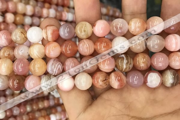 CAA3534 15.5 inches 10mm round pink botswana agate beads