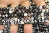 CAA3591 15.5 inches 4mm round black zebra agate beads wholesale