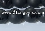 CAA3671 15.5 inches 8mm round matte & carved black agate beads