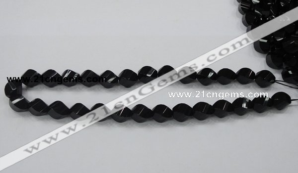 CAB336 15.5 inches 10*14mm faceted & twisted rice black agate beads