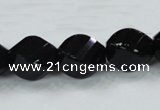 CAB337 15.5 inches 15*20mm faceted & twisted rice black agate beads