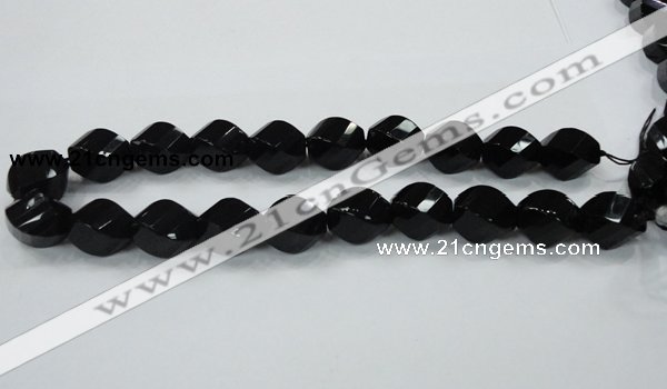 CAB337 15.5 inches 15*20mm faceted & twisted rice black agate beads