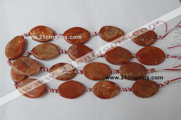 CAG1590 15.5 inches 20*30mm twisted oval fire crackle agate beads