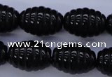 CAG1693 15.5 inches 15*20mm carved rice black agate beads