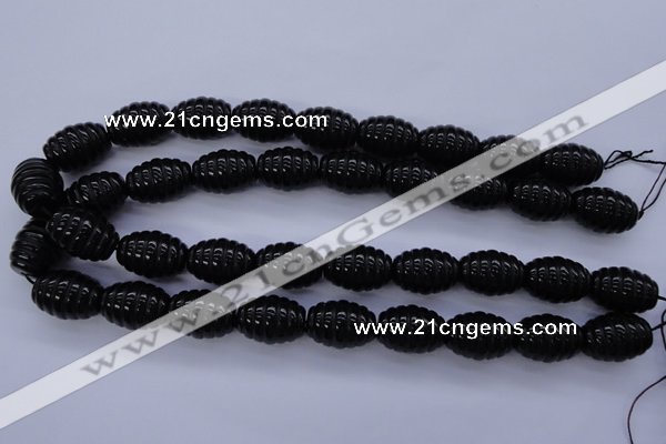 CAG1693 15.5 inches 15*20mm carved rice black agate beads