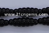 CAG1695 15.5 inches 10*30mm carved rice black agate beads
