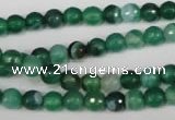 CAG2112 15.5 inches 6mm faceted round green line agate beads