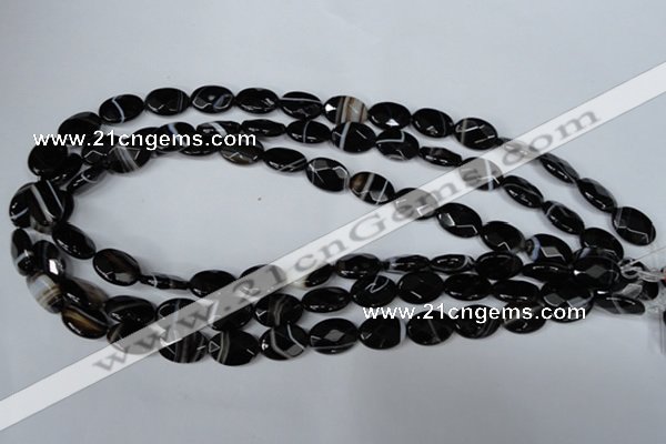 CAG3081 15.5 inches 10*14mm faceted oval black line agate beads