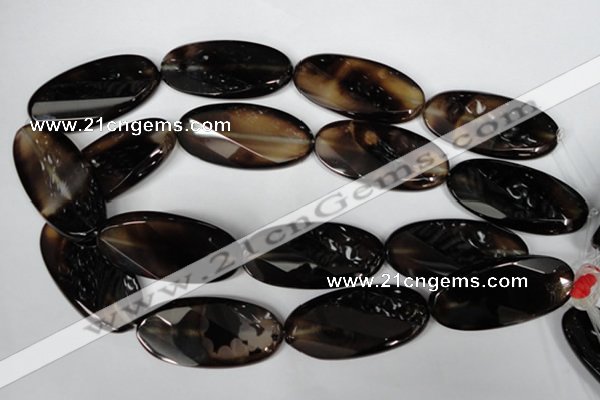 CAG3091 15.5 inches 25*50mm faceted oval black line agate beads