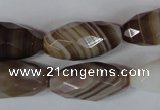 CAG3130 15.5 inches 12*25mm faceted rice brown line agate beads