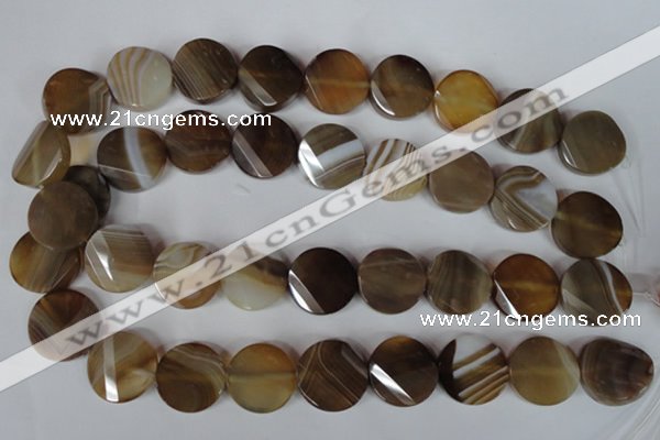 CAG3160 15.5 inches 20mm faceted & twisted coin brown line agate beads