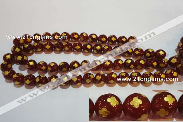 CAG3395 15.5 inches 10mm carved round red agate beads wholesale