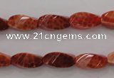 CAG4181 15.5 inches 7*14mm faceted & twisted rice natural fire agate beads