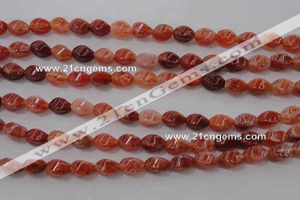 CAG4184 15.5 inches 6*10mm twisted rice natural fire agate beads