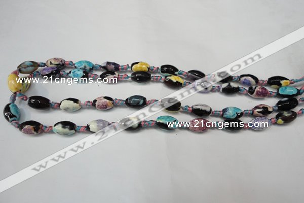 CAG5772 15 inches 8*12mm faceted rice fire crackle agate beads