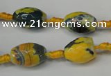 CAG5774 15 inches 10*14mm faceted rice fire crackle agate beads