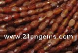 CAG597 15.5 inches 4*6mm faceted rice natural fire agate beads