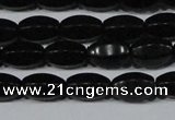 CAG6029 15.5 inches 6*10mm faceted rice matte black agate beads