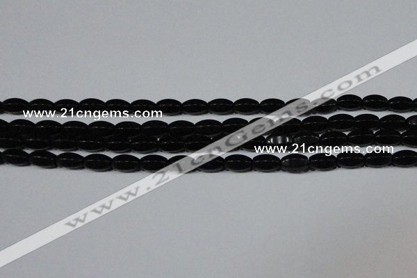 CAG6029 15.5 inches 6*10mm faceted rice matte black agate beads