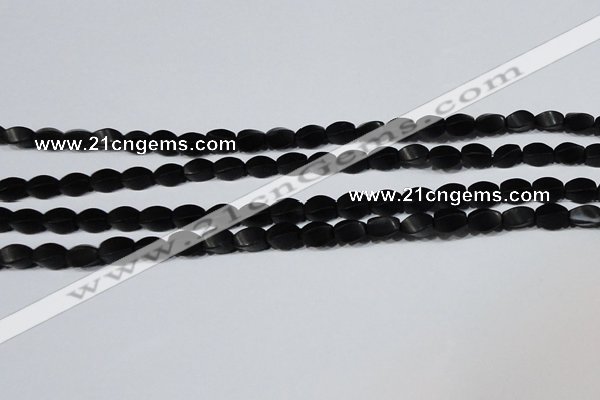 CAG6040 15.5 inches 5*8mm twisted rice matte black agate beads