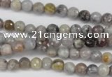 CAG7870 15.5 inches 4mm faceted round silver needle agate beads