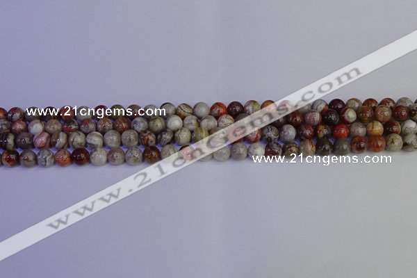 CAG9110 15.5 inches 4mm round Mexican crazy lace agate beads