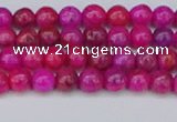 CAG9924 15.5 inches 4mm round fuchsia crazy lace agate beads