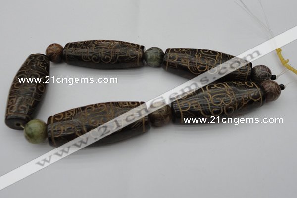 CAL03 14.5 inches 25*60mm carved drum agalmatolite beads