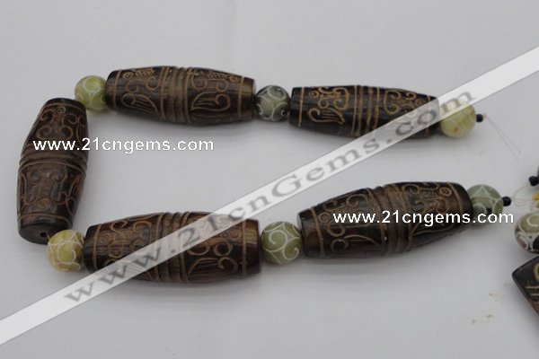 CAL05 14.5 inches 25*60mm carved drum agalmatolite beads