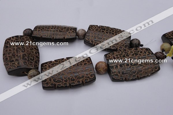 CAL20 14.5 inches 42*59mm carved flat drum agalmatolite beads