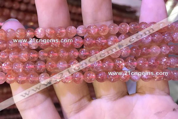 CBQ559 15.5 inches 6mm round golden strawberry quartz beads