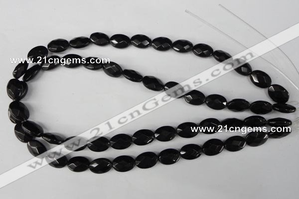 CBS310 15.5 inches 10*14mm faceted oval blackstone beads wholesale