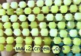 CCU1426 15 inches 6mm - 7mm faceted cube lemon jade beads
