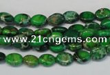 CDE178 15.5 inches 6*8mm oval dyed sea sediment jasper beads
