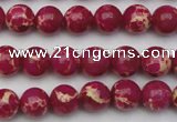 CDE2034 15.5 inches 6mm round dyed sea sediment jasper beads