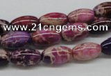 CDE30 15.5 inches 8*12mm rice dyed sea sediment jasper beads