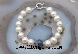 CFB1050 Hand-knotted 9mm - 10mm potato white freshwater pearl & sodalite bracelet