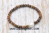 CFB766 faceted rondelle yellow tiger eye & potato white freshwater pearl stretchy bracelet