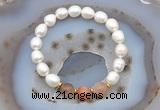 CFB913 9mm - 10mm rice white freshwater pearl & rainbow moonstone stretchy bracelet