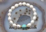 CFB926 9mm - 10mm rice white freshwater pearl & blue sea sediment jasper stretchy bracelet