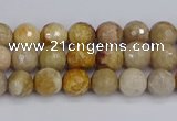 CFC228 15.5 inches 4mm faceted round fossil coral beads