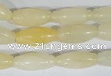 CFG552 15.5 inches 8*20mm carved rice yellow aventurine beads